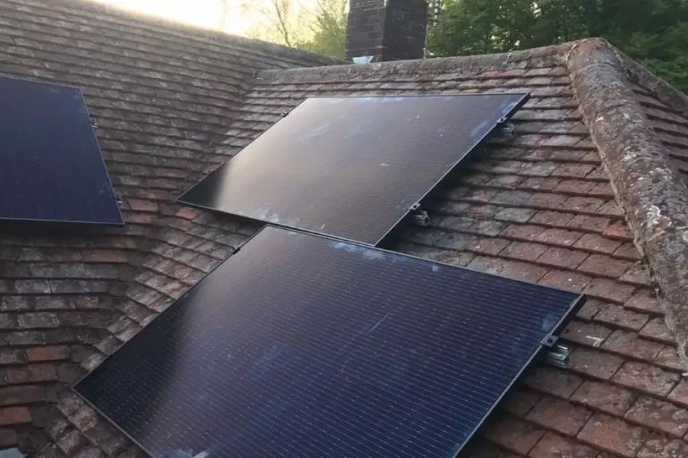 Two-story house equipped with solar panels on the roof