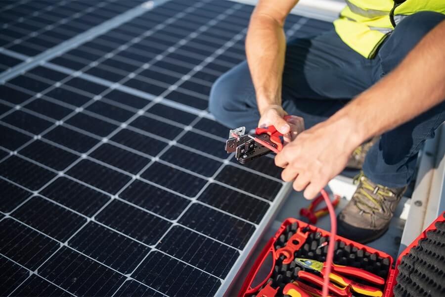 working on solar panels